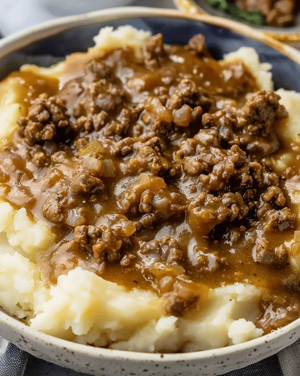 Ground Beef and Gravy: Comforting Delight Over Mashed Potatoes